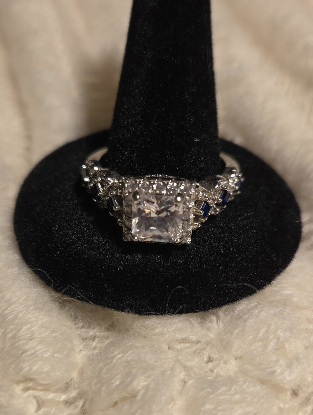 Elegant Sterling Silver Ring with Clear Square Center Stone and Blue Accent Gems
